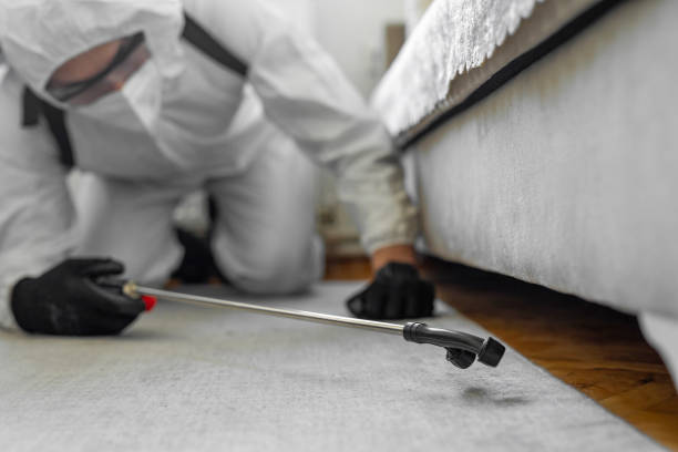 Professional Cockroach Control technician working in Milan, IN